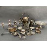 A quantity of silver plated ware including spirit kettle, pair of three light candelabra, pedestal