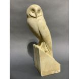 A cast figure of an owl, 40cm high