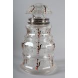 AN ART DECO .800 SILVER COLLARED GLASS COCKTAIL SHAKER, domed lid, over baluster body etched and