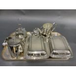A pair of rectangular plated entrée dishes, a Victorian plated teapot, a small bullet shaped teapot,