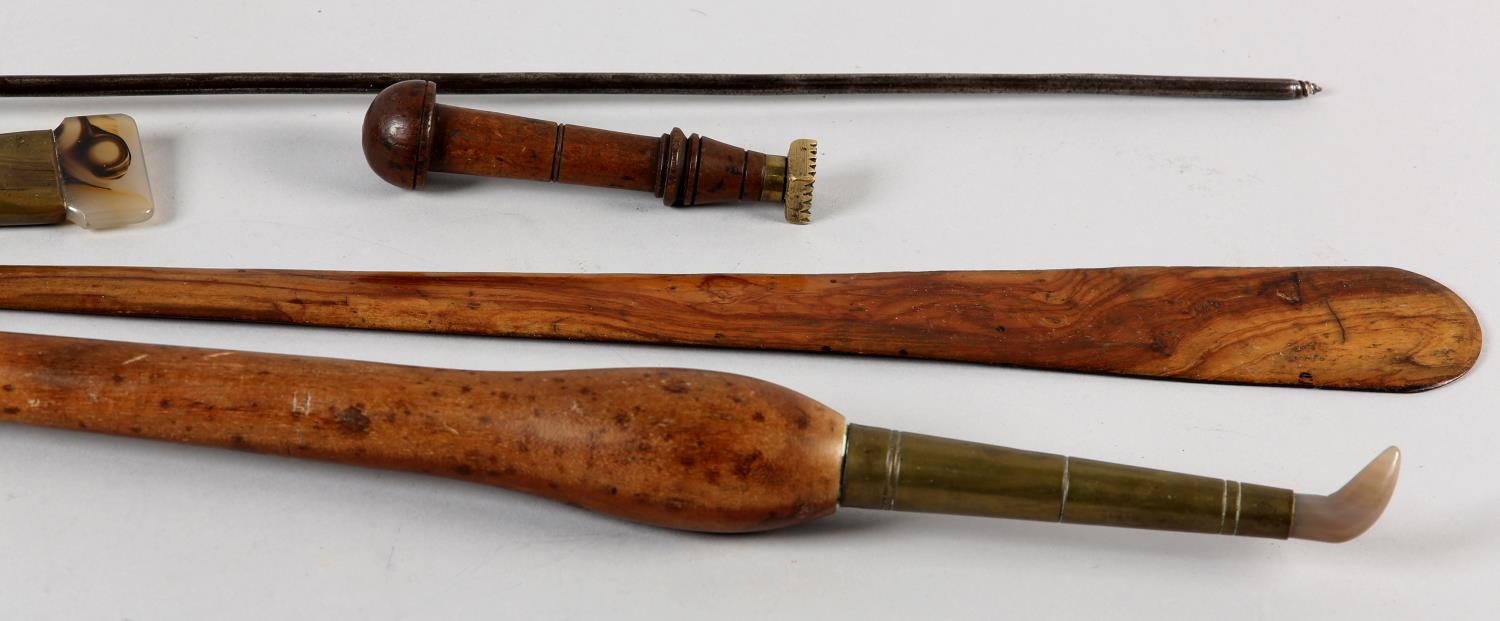 A collection of 19th century hardwood and brass mounted leather working tools, two with agate heads, - Image 3 of 4