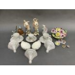Pair of china figures of classical females, three small china wall brackets, a pair of Coalport