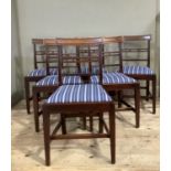 A set of six early 19th century mahogany dining chairs having a moulded top rail, rail and ball