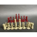 A carved bone chess set, complete
