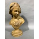 An Italian carved walnut bust of a young girl wearing a bonnet, on turned socle and circular base,