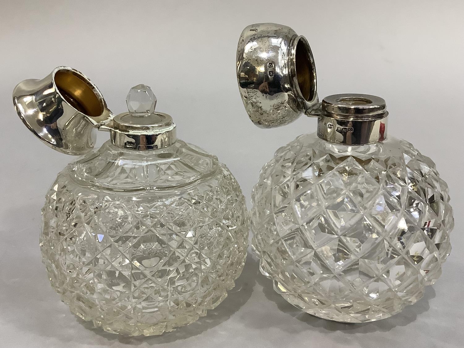 TWO GLOBULAR DIAMOND CUT GLASS SCENT BOTTLES with silver collars and hinged tops, Birmingham 1913 - Image 3 of 3