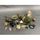 A set of three harlequin glass floats of graduated size, various seashells, agate samples, pottery