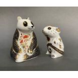 A Royal Crown Derby paperweight in the form of a panda with silver button and of a mouse with a gilt