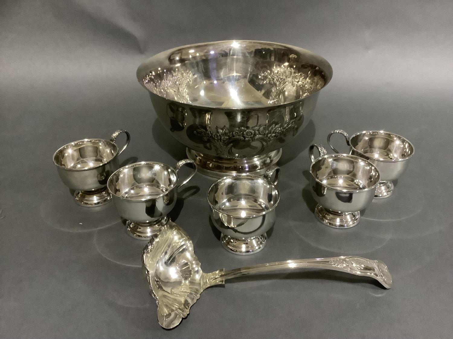 A good silver plated punch bowl with six cups and ladle, embossed with flowers and blind cartouche, - Image 2 of 5