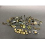 Tin of Military cap badges, buttons, cycling and speedway badges plus World War One, 1914/15 star