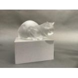 A Lalique opaque glass figure of a cat, etched signature to underside, 23cm long x 9cm high