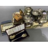 A four piece silver plated tea service of compressed circular form together with items of boxed