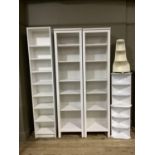 A pair of white open book shelves, 198cm x 49cm, together with a white melamine open bookcase, 202cm