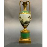 A 19th century continental two handled vase finely painted with a continuous river landscape