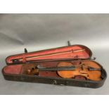 An antique rosewood veneered violin case a later violin and two bows, all unmarked