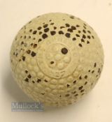 The Opresto 27 ½ bramble pattern guttie golf ball - in unused condition showing most of the original