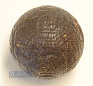 Large Hand Hammered Guttie Golf Ball in style of Forgan - still in its black original finish - a