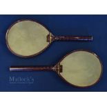 Pair of Vic small Battledore rackets - both with vellum faces, red trim, remains of the original