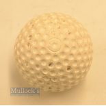 Small heavy very deep recessed pattern hybrid golf ball- with bulls eye markings to the pole -