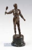 Bronzed Spelter Male Tennis figure on marble base, the figure dressed in early c1900 clothes, 24cm