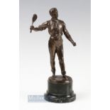 Bronzed Spelter Male Tennis figure on marble base, the figure dressed in early c1900 clothes, 24cm