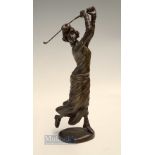 Heavy Bronzed Brass golfing figure of 1920s lady Golfer - mounted an oval base - overall 12.75"h