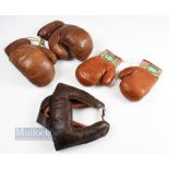 Leather Laced Boxing Gloves and Head Guard an adult's pair of gloves and an adult head guard, both
