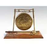 Edwardian Style Brass Golfing Dinner Gong - mounted on light stained rectangular base featuring golf