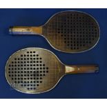 Pair of Wooden Paddleball Rackets, with a metal strengthening edge trim, 42 1/2cm long in used