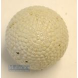 Fine Goodyear "The Arrow" bramble pattern golf ball c1900 - appears unused with 99% original paint
