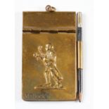 Small Brass Note Pad and Pencil with embossed figure of young golfing caddy c1920/30s - c/w spring