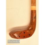 An attractive small wooden head driver shaped golf walking stick with rounded sole, brown fibre