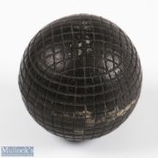 Fine late 19thc small black moulded mesh guttie golf ball c1890 - appears unused in fine round