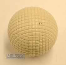 Fine and original Finely Moulded Mesh Marked large Guttie Ball - with all the original white paint -