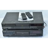 2x Technics Compact Disc Player SL-PG490 in black, with remote controls, and original boxes. From