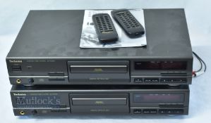 2x Technics Compact Disc Player SL-PG490 in black, with remote controls, and original boxes. From