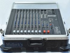 Studiomaster Session Mix 8-2 Gold mixer fixed onto hinged base, encased within SKB aluminium edged