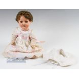 Heubach Koppelsdorf Antique German Child doll 320.2/0, with bisque head glass eyes and 2 front teeth