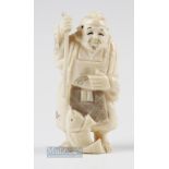 Small Antique Japanese Carved Marine Ivory Fishing figure with spear and fish, 7cm tall, has some