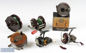 Selection of Fishing Reels featuring a wood and alloy centre pin reel 3 ½" spool with twin