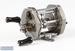 J W Young & Sons Gildex Multiplier Reel c1960s with hexagonal sides, folding foot, grey body, runs