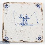 Delft style antique tile with fishing scene in typical blue decoration some crazing, and pitting