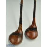 2x Walter Hagen large headed striped topped socket neck spoons - both fitted with full length grips