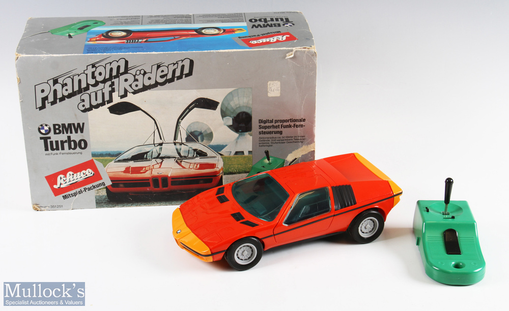 Schuco Large-Scale Remote-Controlled BMW Turbo Boxed Car with dark orange body and light orange