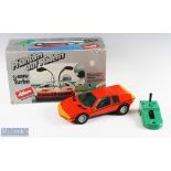 Schuco Large-Scale Remote-Controlled BMW Turbo Boxed Car with dark orange body and light orange