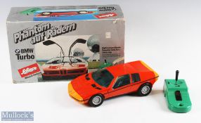 Schuco Large-Scale Remote-Controlled BMW Turbo Boxed Car with dark orange body and light orange