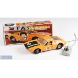 Piko Made in GDR GD22 119 Mangusta De Tomaso Remote Controlled Car in orange colour with black