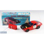 Asahi, Japan Battery Operated Radio-Controlled Datsun 240Z Boxed in red plastic with black bonnet