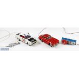 Two Tinplated Battery-Operated Remote-Controlled Cars SKK, Japan Mercedes Benz 300 SL in red with