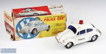 Alps Tokyo, Japan Battery Operated VW Beetle Police Car in white with blue windows and red top